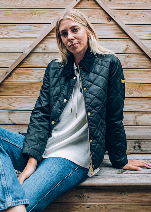 Lindsey Holland wears the Barbour International AW21 Sports Luxe Collection